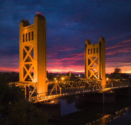Creative Recruiting Sacramento CA - image of bridge over river in Sacramento, CA at sunset